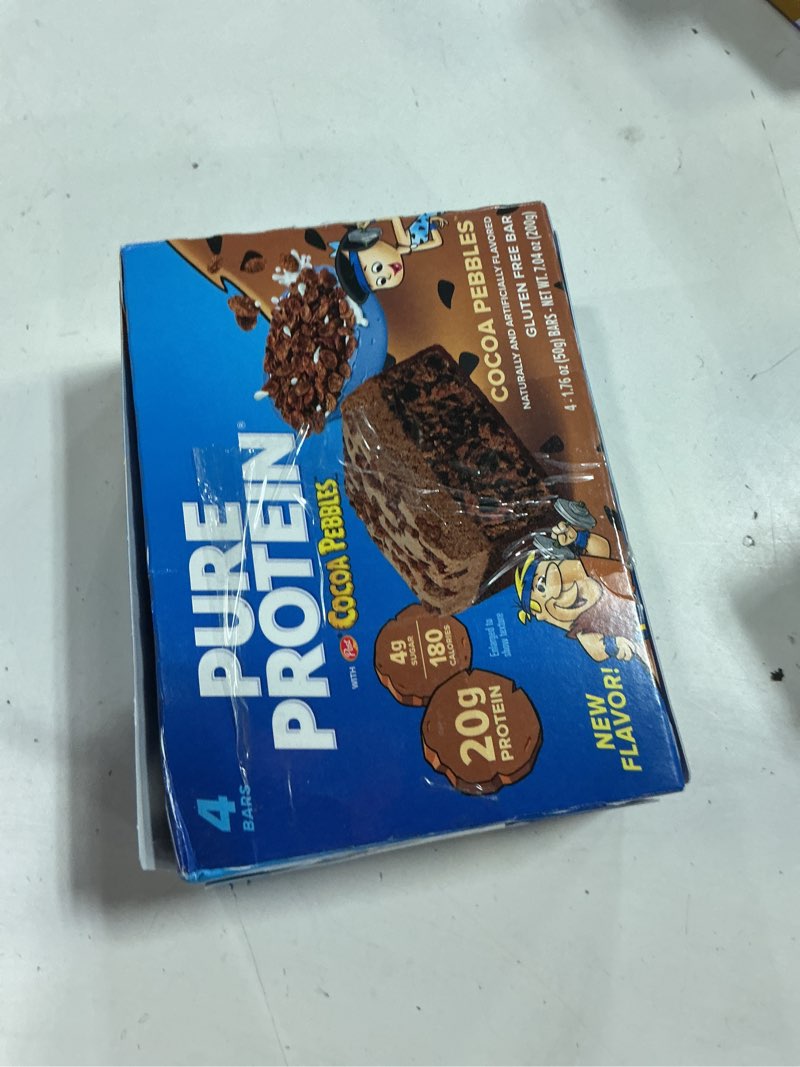 Condition photo showing New/Like New for (best by 12/18/26) pure protein cocoa pebbles™ protein bars – 20g protein, 4g sugar, 180 calories (4 count) low sugar*