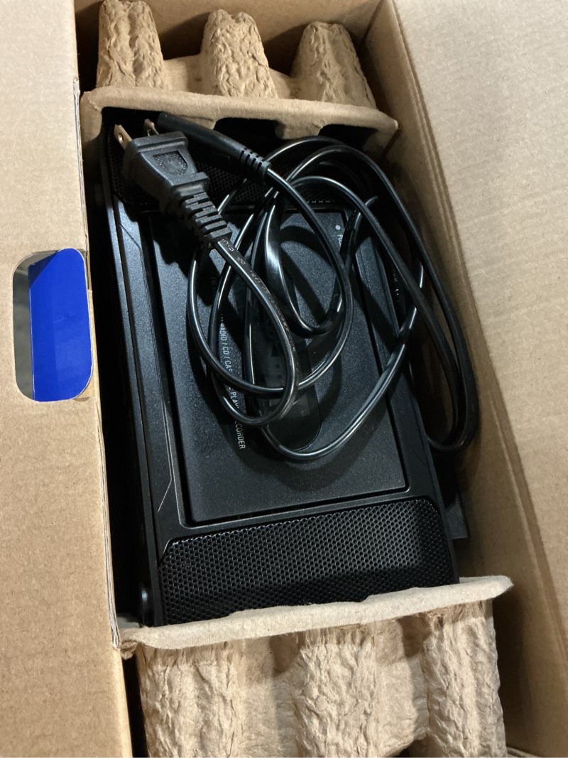 Condition photo showing As Is for onn cassette boombox with bluetooth, cd, mp3 and radio features