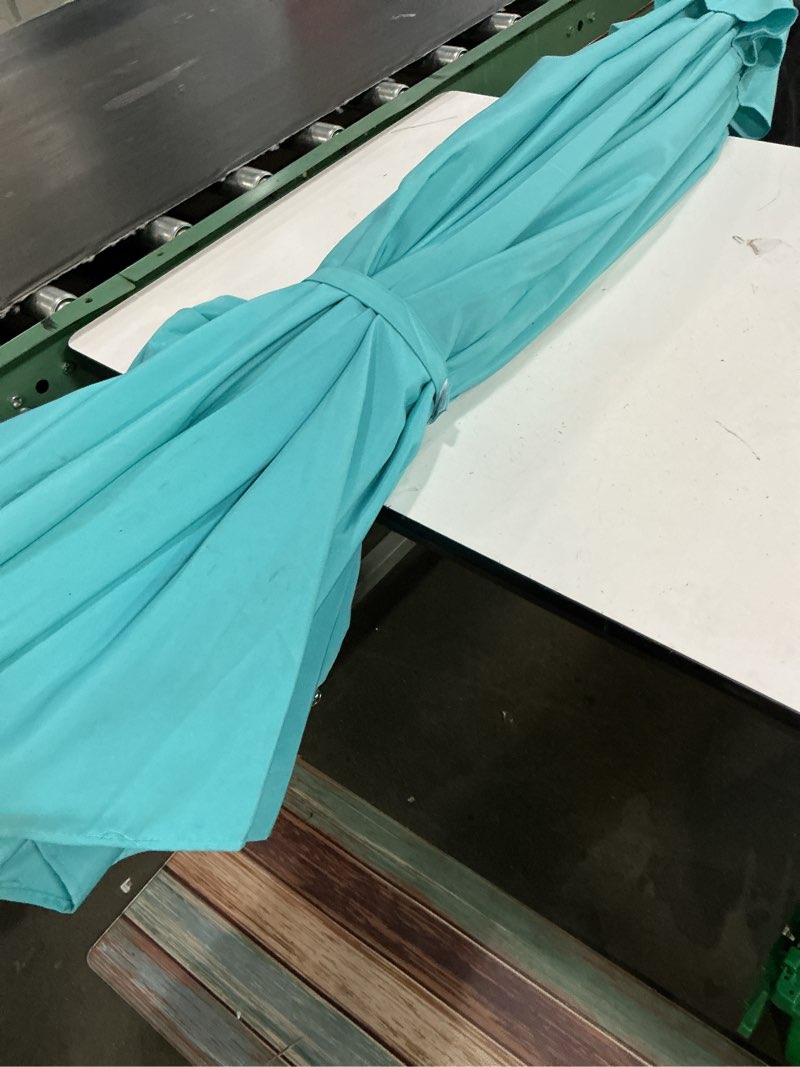 Condition photo showing As Is for westintrends 15 x 9 ft twin double sided outdoor umbrella, large rectangle for patio balcony with crank lift (base not included), turquoise