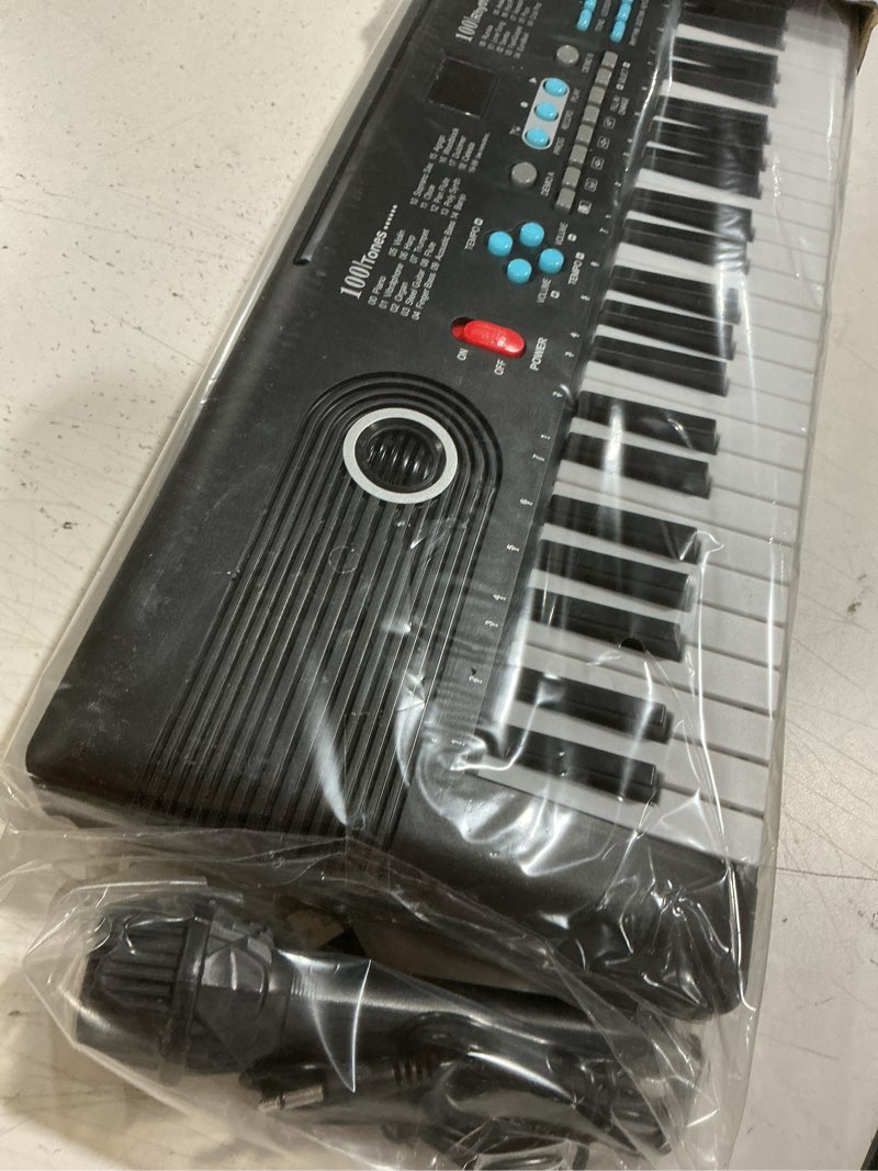 Condition photo showing Good Condition for 61 keys keyboard piano, electronic digital piano with built-in speaker microphone, portable keyboard gift teaching for beginners, electric piano for kids black