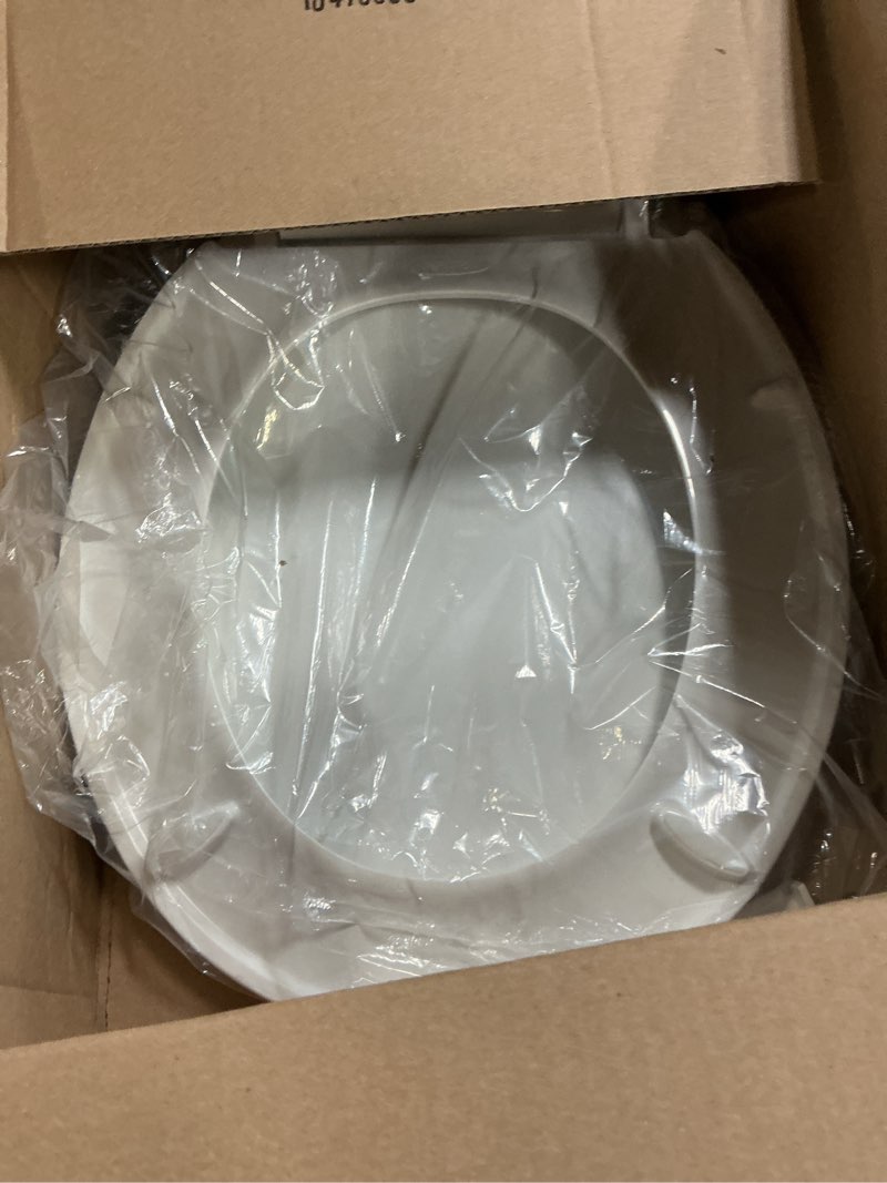 Condition photo showing As Is for kohler 20111-0 brevia, slow close toilet seat, round toilet seat, grip-tight bumpers quick-attach hardware, white