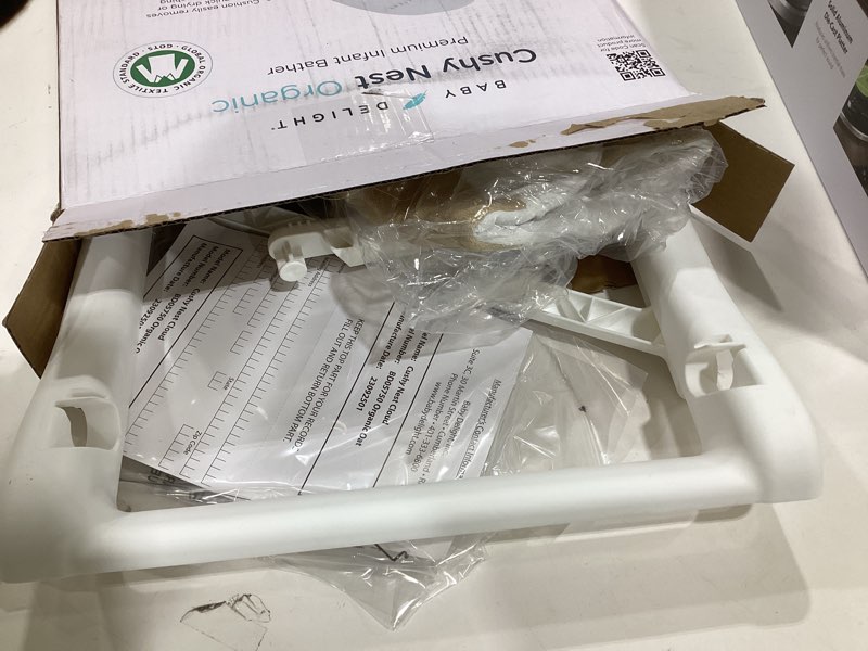 Condition photo showing New/Like New for Baby Delight Cushy Nest Cloud Premium Organic Infant Bather | Baby Bath Seat | Comfortable Infant Bath Seat with Support | for Sinks and Tubs | Organic Oat