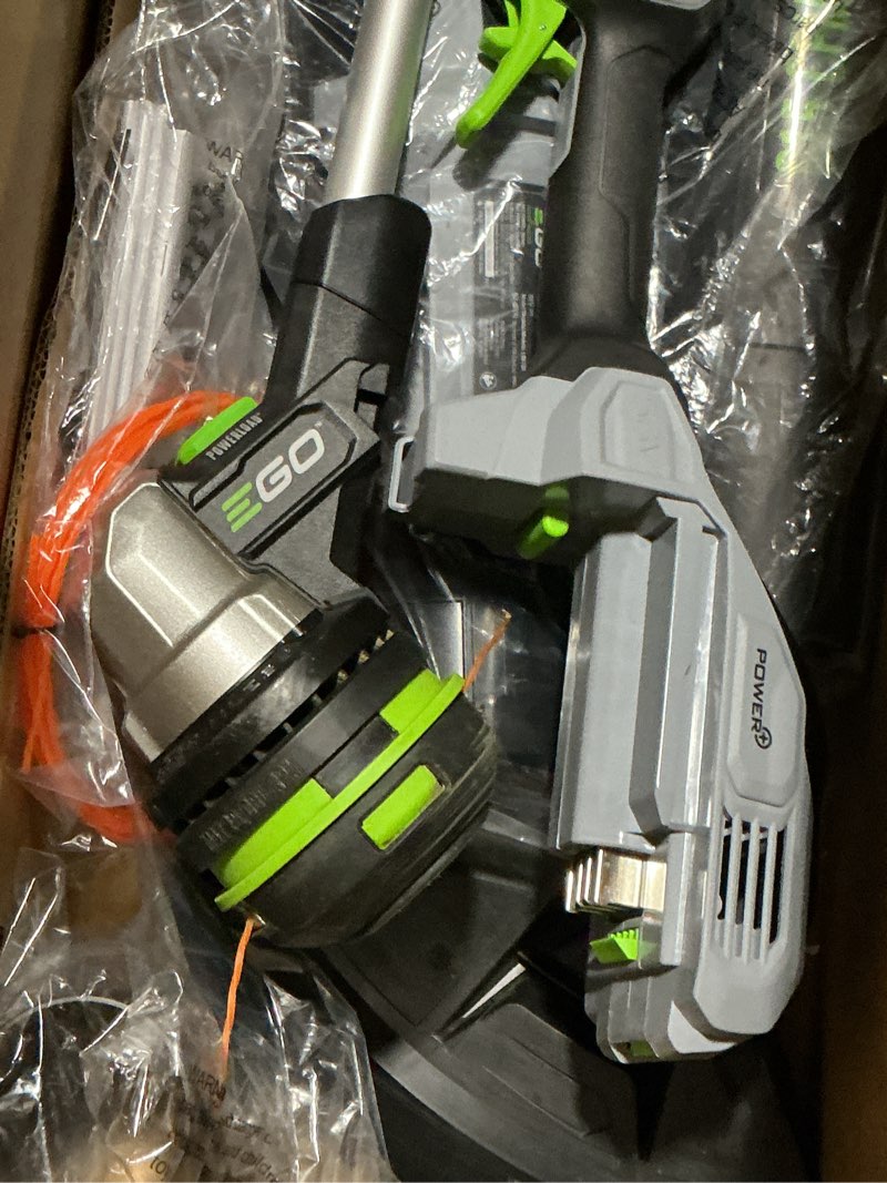 Condition photo showing As Is for ego power+ battery blower/trimmer kit (battery & charger)