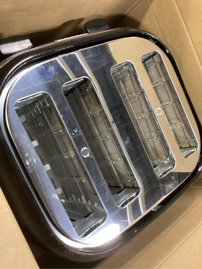 Condition photo showing As Is for BLACK+DECKER 4-Slice Toaster, Extra Wide Slots, 7 Shade Settings, 1400 Watts, Frozen and Bagel Buttons, Toast Shade Selector, Extra Lift 4-Slice Black