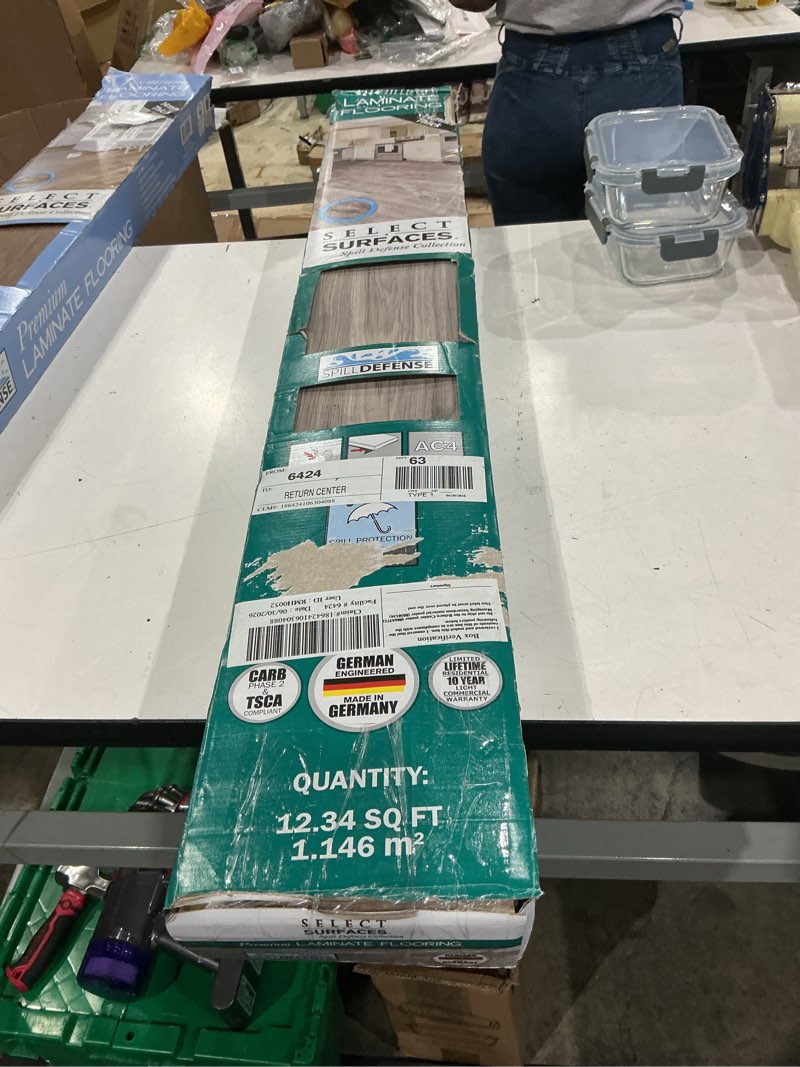Condition photo showing Good Condition for select surfaces southern gray spill defense laminate flooring