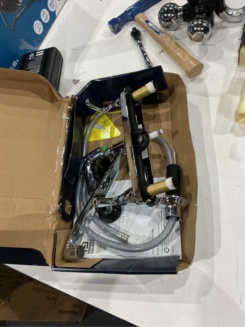 Condition photo showing As Is for project source dover chrome double handle deck-mount kitchen faucet (includes deck plate) (includes side sprayer)