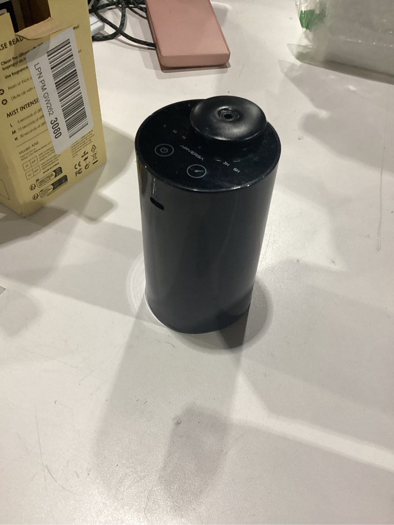 Condition photo showing New/Like New for airversa waterless diffuser for essential oil, car diffsuer, battery operated nebulizer, 0.7 fl oz/ 20ml, mini scent air machine, 3 timers & 3 mist levels for home, room, car, office - an6 black black 1 pack