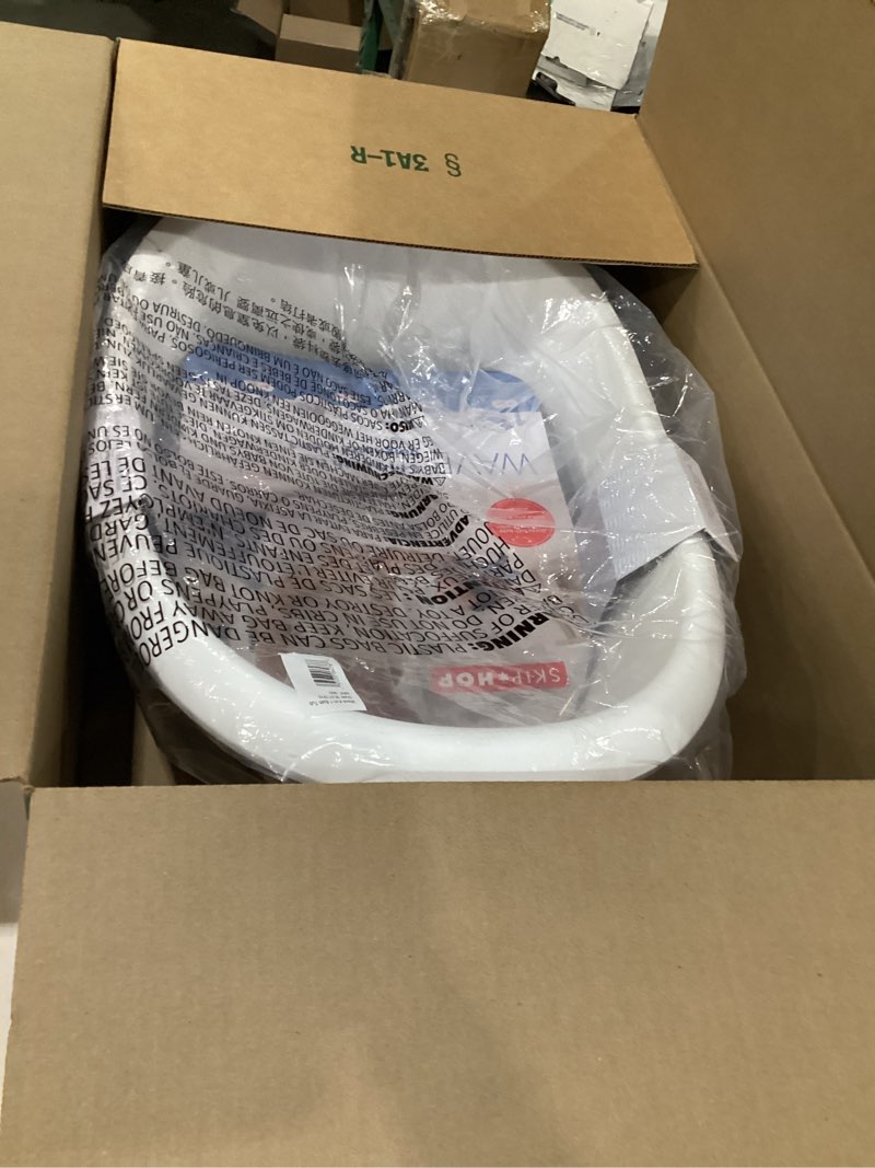 Condition photo showing New/Like New for skip hop baby bath tub 4-in-1 grow with baby infant to toddler bathtub with supportive sling and sit-up support wave age 0m+ wave tub