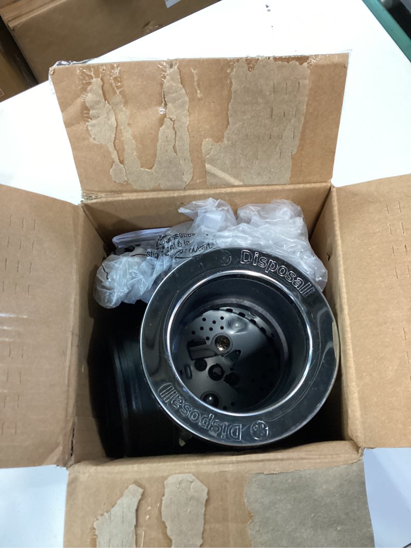 Condition photo showing As Is for GE Disposall Continuous Feed 1/2 Horsepower Motor Garbage Disposer, Good for Grinding: Cooked Meat, Beans, & Seeds, Easy Install Kit, Non-Corded, Recommended for 2-4 Person Homes, GFC520N 1/2 HP Non-Corded