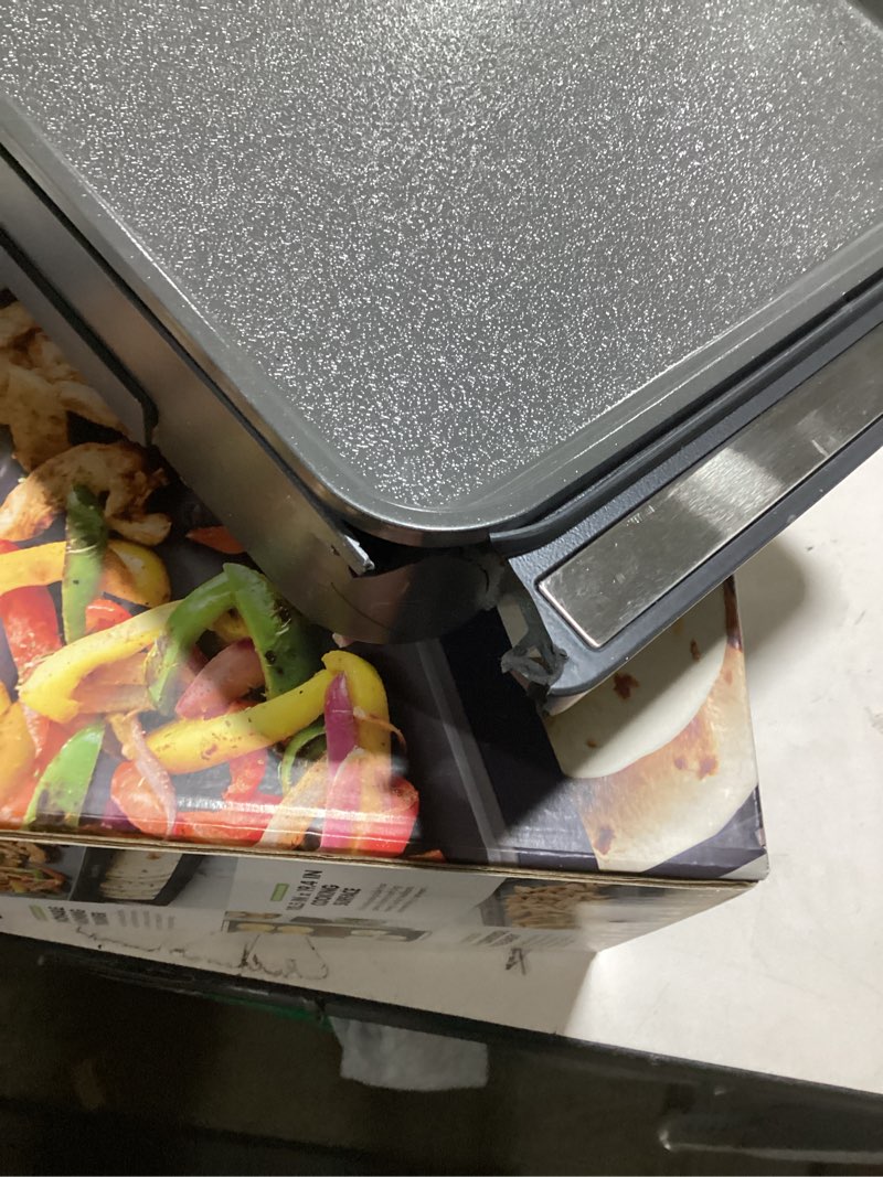 Condition photo showing As Is for GreenPan Advanced 10.5”x 20” Electric Griddle with Warming Drawer, Healthy Ceramic Nonstick PFAS-Free Coating, Temperature Control, Easy and Versatile Countertop Meals, Dishwasher Safe, Graphite 10.5" x 20" Electric Griddle Graphite