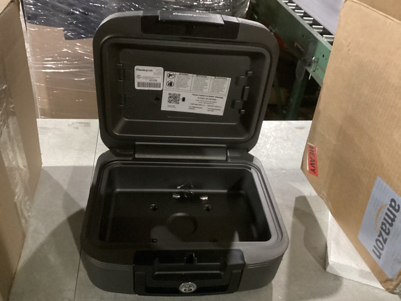 Condition photo showing Good Condition for SentrySafe Dark Gray Fireproof and Waterproof Safe with Key Lock, Chest Lock Box with Carrying Handle for Travel, 0.28 Cubic Feet, 6.6 x 15.4 x 14.3 Inches, CFW20201 1 Hr. Fireproff, No lid Straps