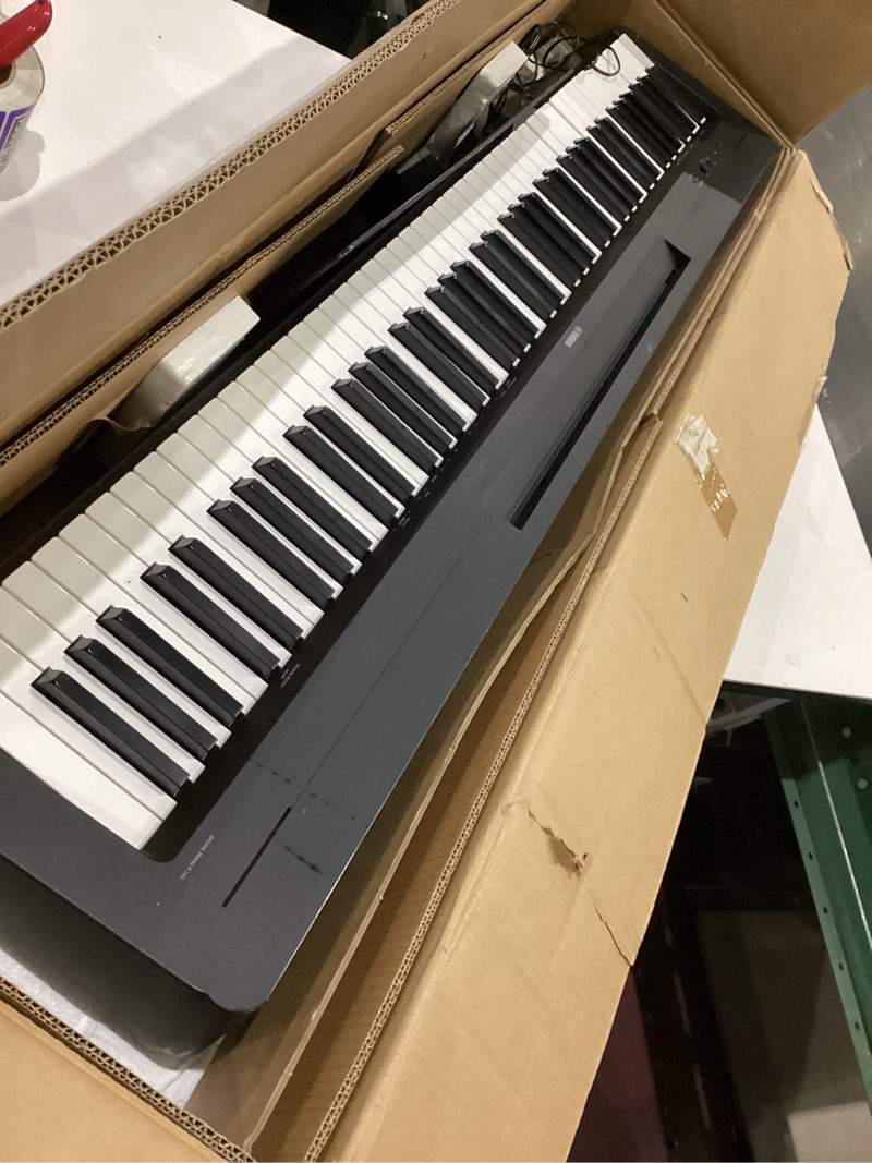 Condition photo showing Good Condition for yamaha weighted action 88-key digital piano , includes power adapter and sustain foot switch p143 black