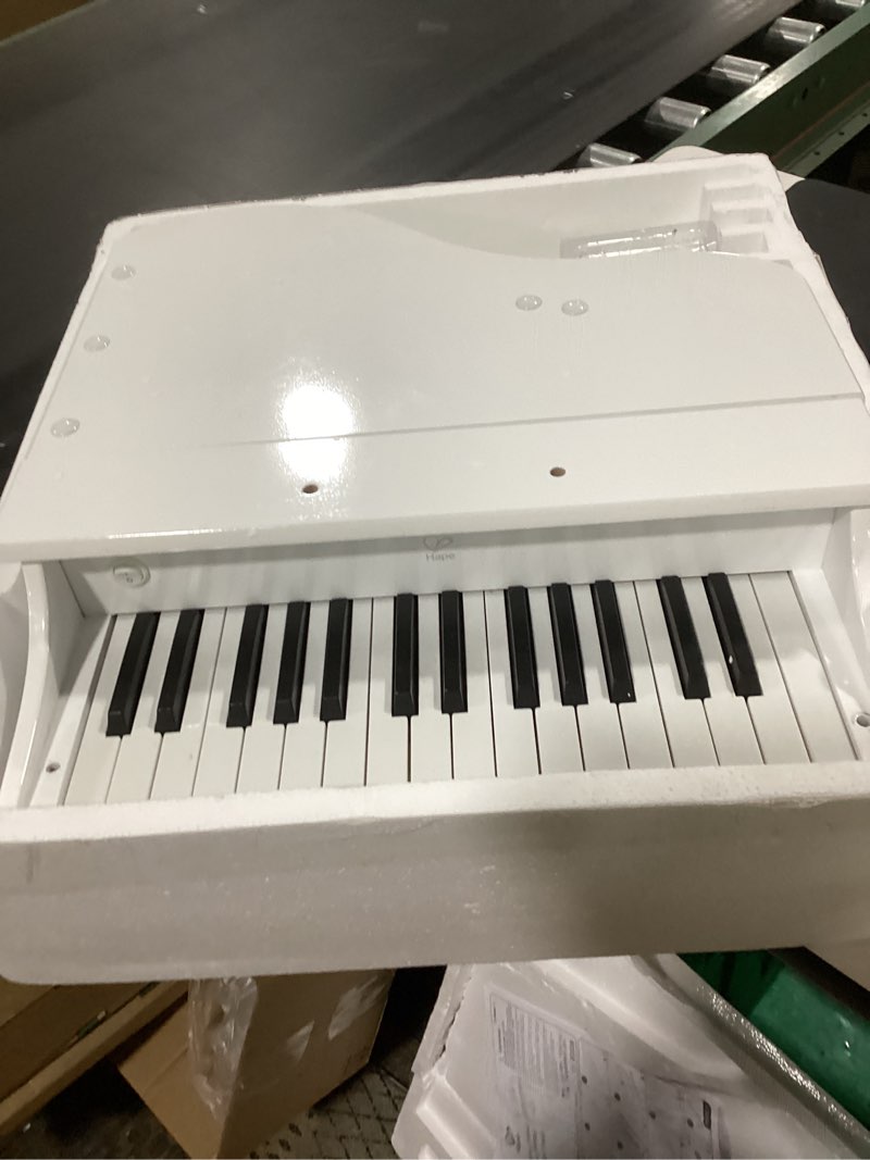 Condition photo showing Good Condition for hape deluxe white grand piano | thirty key piano toy with stool, electronic keyboard musical toy set for kids 3 years+