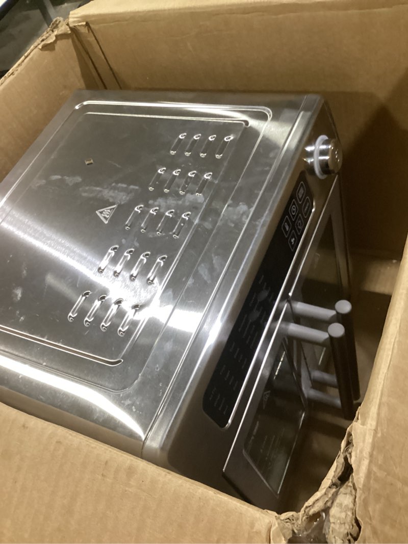 Condition photo showing As Is for Emeril Lagasse Extra Large French Door Air Fryer Toaster Oven Combo, 24 Cooking Functions and Digital Controls, 7 Accessories Included, Stainless Steel Finish, 26QT Capacity