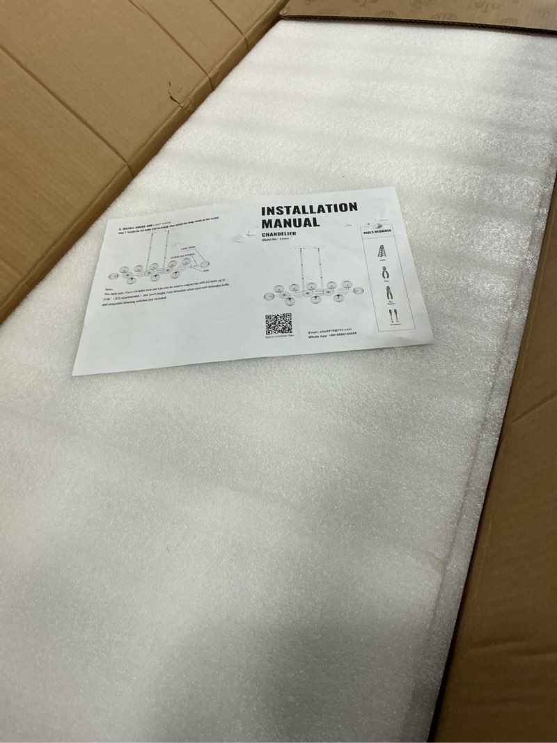 Condition photo showing Good Condition for MOOONIHCE Linear Rectangle Chandelier for Dining Room, 12 Lights Mid Century Globe Chandeliers with Clear Glass Shades, Sputnik Pendant Ceiling Light Fixture Over Table, Black Black 39.4"-12 Light