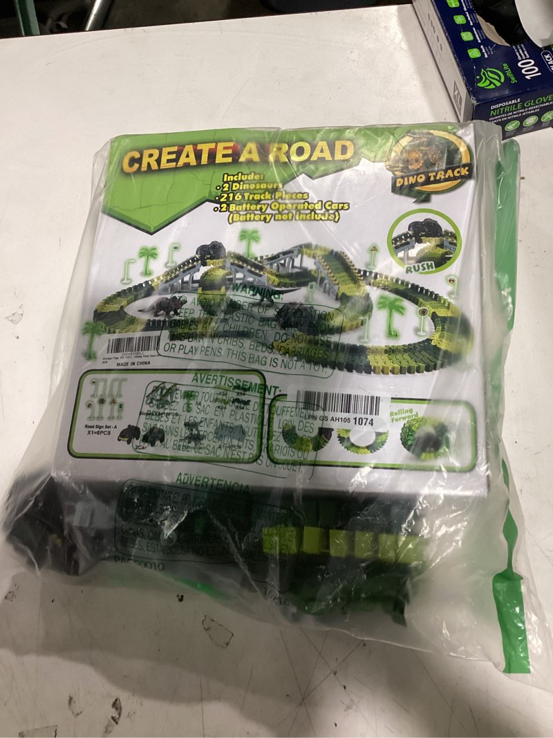Condition photo showing Good Condition for dinosaur toys,create a dinosaur world road race,flexible track playset and 2 pcs cool dinosaur car for 3 4 5 6 year & up old boy girls best gift green