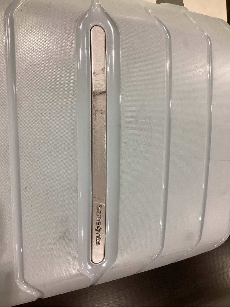 Condition photo showing As Is for Samsonite Freeform Hardside Carry-On Luggage with Spinner Wheels - Hardshell Suitcase - TSA, Airline-Approved - Expandable Hard Shell, Smooth Rolling Wheels for Lightweight Travel - Powder Blue Carry-on Spinner Powder Blue