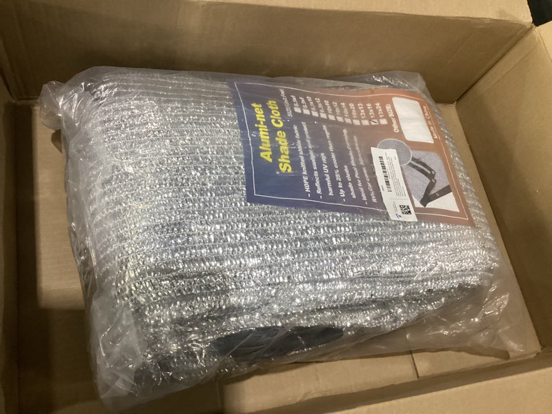 Condition photo showing Good Condition for 70% aluminum shade cloth 13 ft x 16 ft, durable mesh silver tarps with grommets and ball bungee,reflective sun shade net cover for pet shade, car cover, patio garden, pergola, plants growing, pools 70% shade silver 13 ft x 16 ft