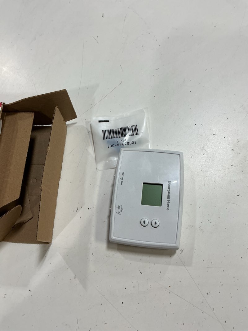 Condition photo showing As Is for honeywell home electronic non-programmable thermostat (missing parts)