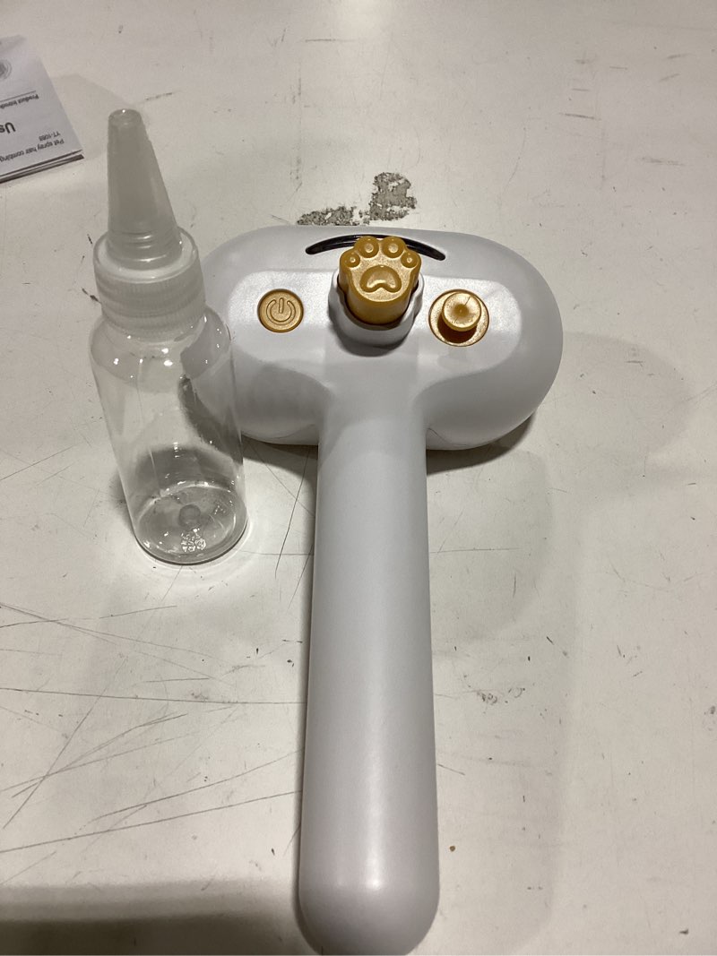 Condition photo showing As Is for Pet Steam Brush for Dog & Cat – 3-in-1 Spray Hair Removal Comb for Shedding & Grooming, Softens Fur & Reduces Static – Water Brush for Long & Short Coats, Bath-Hating Pets, Includes 2*Shampoo 7.6?-2*shampoo