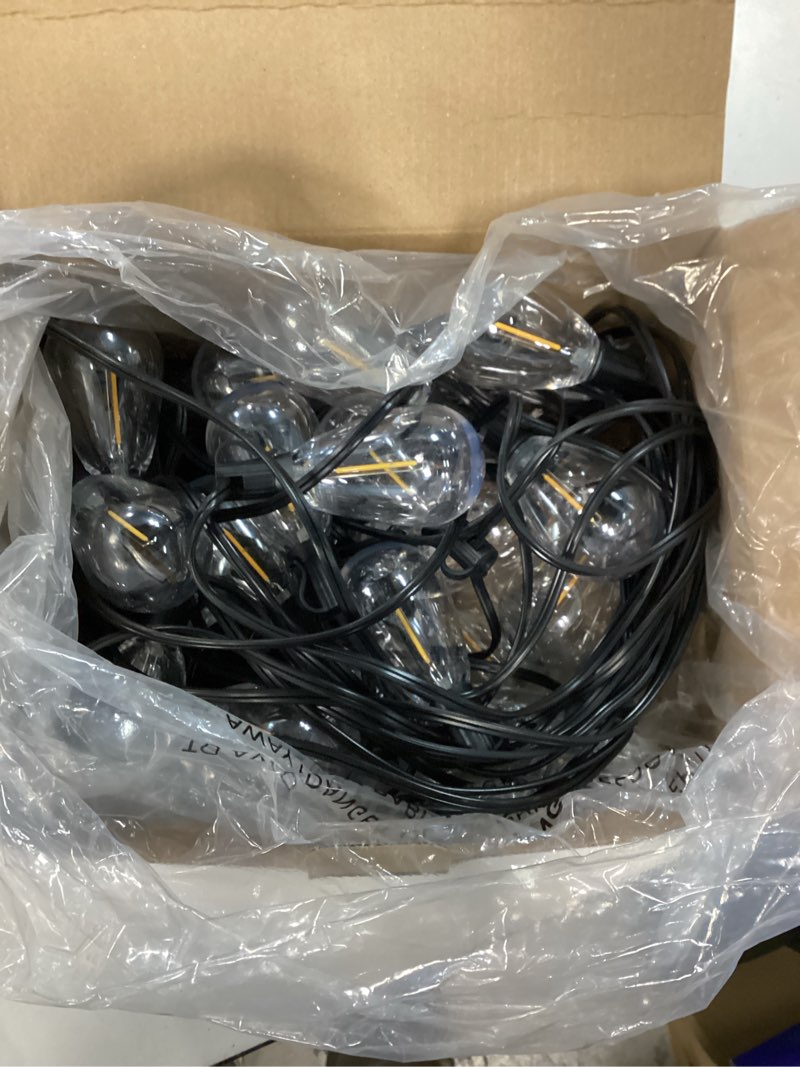 Condition photo showing New/Like New for 60ft(50+10) outdoor string lights, 2ft spacing 25 led edison bulbs, waterproof, shatterproof, dimmable, warm white, 3 modes, timer, plug in hanging backyard lights for outside, patio 50+10ft(25 sockets)