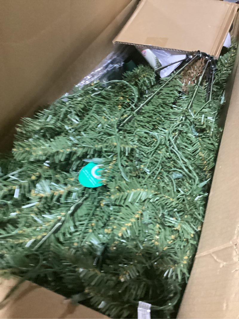 Condition photo showing As Is for Puleo International 7.5ft Pre-Lit Slim Fraser Christmas Tree with 500 Clear Lights, 1453 Realistic Dense Branch Tips, Easy Setup Artificial Trees with Sturdy Metal Stand 7.5' Slim Fraser Fir with 500 Clear Lights