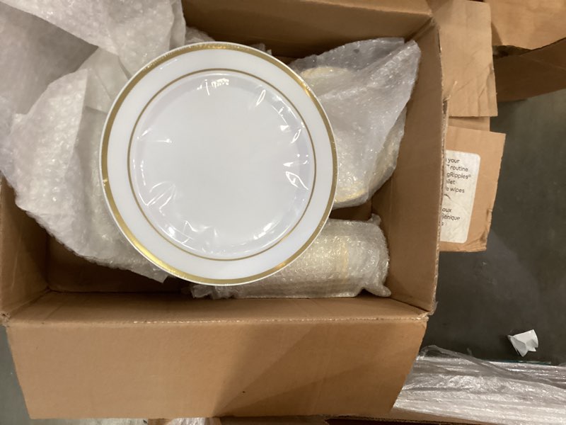 Plastic plates and saucer plates and roll of cups