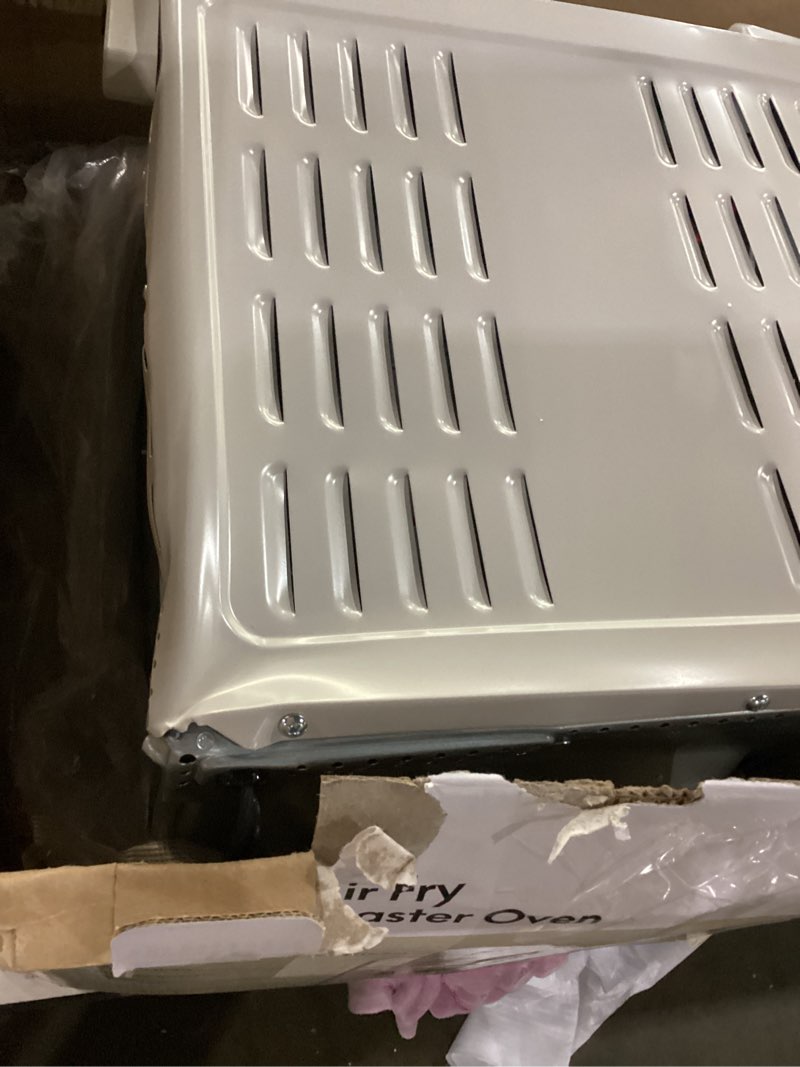 Condition photo showing As Is for not tested ***bella air fry toaster oven, 7 preset cooking options, dishwasher-safe evergood coated trays included, 60-minute auto shutoff w audible timer, power indicator light, 1700 watt, oatmilk
