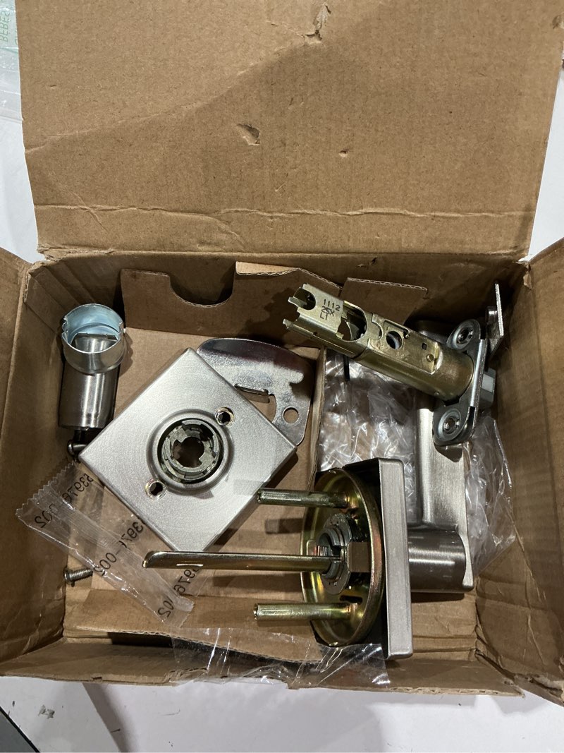 Condition photo showing As Is for kwikset casey interior passage door handle, lever for closet and hallway doors, reversible non-locking handle lever, satin nickel , with microban protection satin nickel 1 pack passage