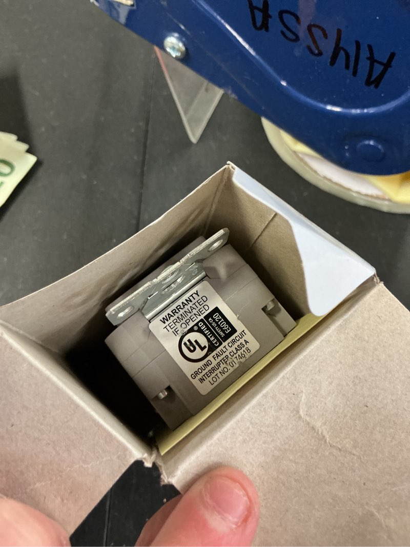 Condition photo showing As Is for eaton 15-amp 125-volt gfci residential decorator outlet, gray