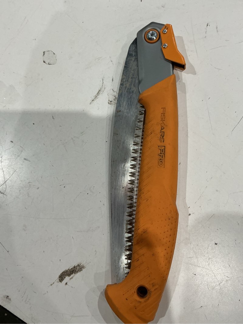 Condition photo showing As Is for fiskars powertooth 10-in steel folding pruning saw