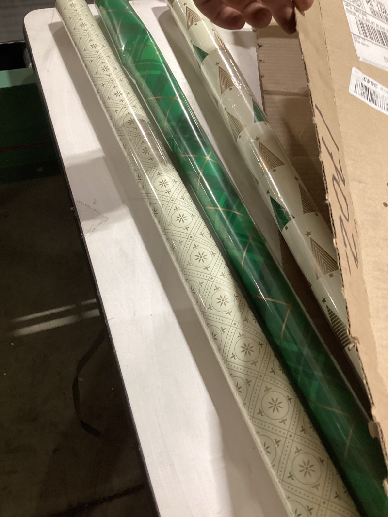 Condition photo showing New/Like New for Hallmark Elegant Christmas Wrapping Paper with Cut Lines on Reverse (3 Rolls: 120 sq. ft. ttl) Gold Trees, Emerald Green Plaid, Gold Geometric Snowflakes