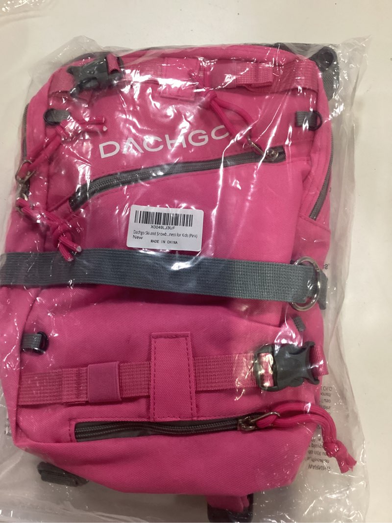 Condition photo showing New/Like New for Ski and Snowboard Harness with Training Leash for Kids - Teach Your Child The Fundamentals of Skiing or Snowboarding Pink Backpack with Traning Leash