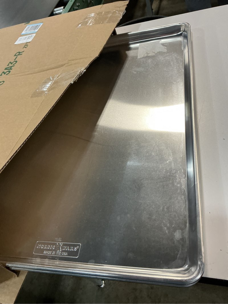Condition photo showing Good Condition for Nordic Ware Aluminum Full Size Sheet Pan 26 x 18 inches for commercial oven use, Full Sheet, 2-Pack (For Commercial Oven Use., Not for standard home ovens)