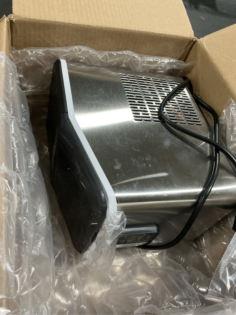 Condition photo showing As Is for Aeitto Ice Maker Countertop 26lbs/24H, Ice Machine 8 Ice Cubes Ready in 6 Mins, 2 Sizes of Bullet Ice Portable Ice Makers with Basket & Scoop, Auto Self-Cleaning for Home/Kitchen/Office Stainless 26LBS Silver 1