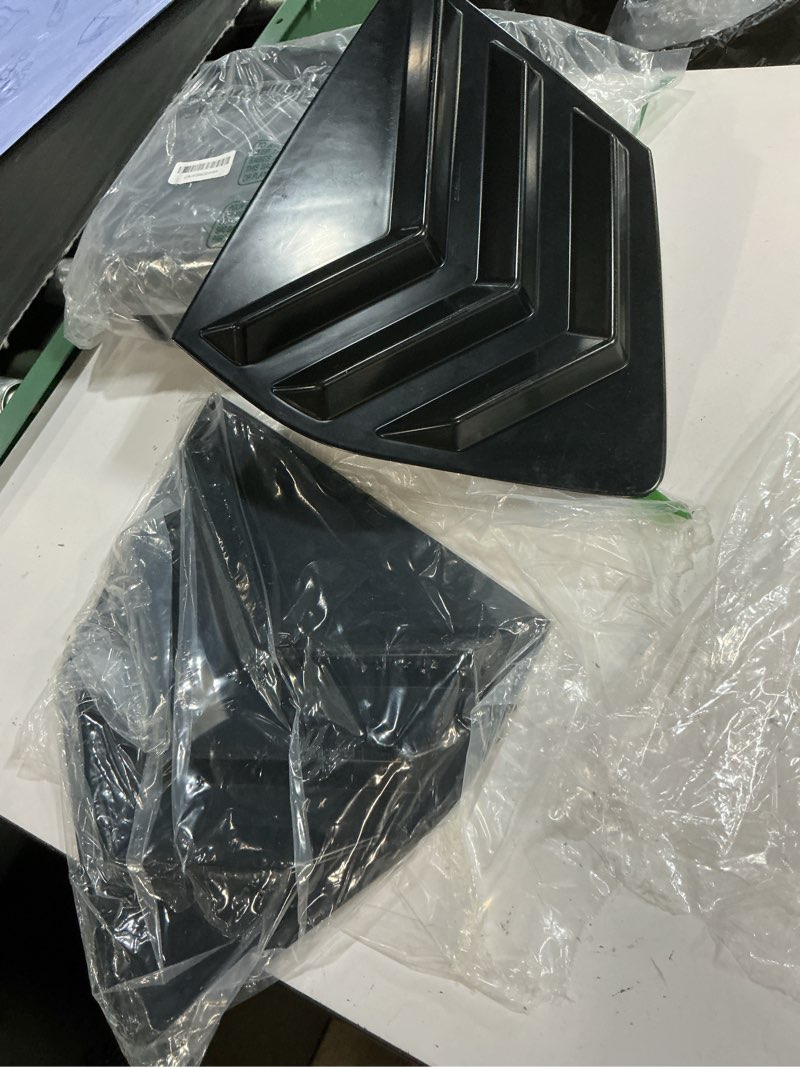 Condition photo showing As Is for rear side window louvers, set of 2 (specs unknown)