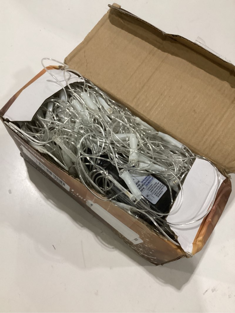 Condition photo showing As Is for jmexsuss outdoor net lights waterproof, 12ft x 5ft plug in with 8 modes remoter, 360 led net lights for for bush patio christmas tree decor (clear wire, warm white) warm white 360 led, not tested