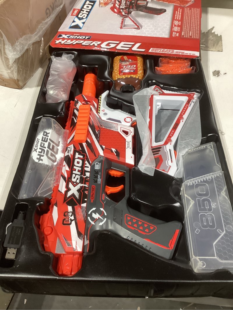 Condition photo showing Good Condition for XSHOT Hyper Gel Trace Fire Blaster, Semi and Fully Automatic Gel Blaster & 10,000 Gellets, 600 Capacity Hopper & 850 Capacity Mag, Ages 14 & Up by ZURU