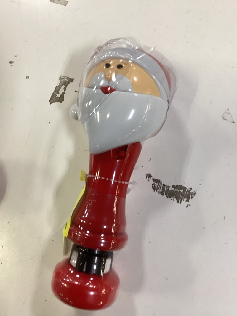 Condition photo showing New/Like New for holiday santa bubble wand, included 2.2floz bubble solution. batteries required (not included)
