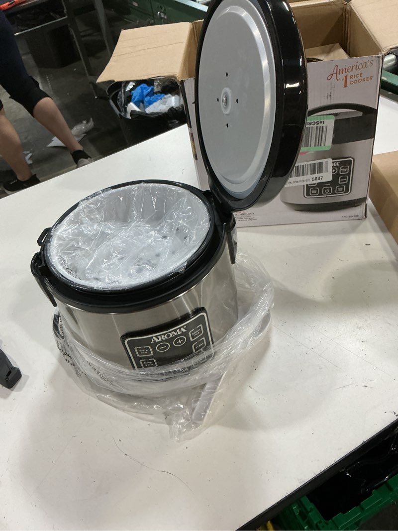 Condition photo showing As Is for aroma digital rice cooker, 4-cup (uncooked) / 8-cup (cooked), steamer, grain cooker, multicooker, 2 qt, stainless steel exterior, arc-914sbd 4 cup uncooked / 8 cup cooked