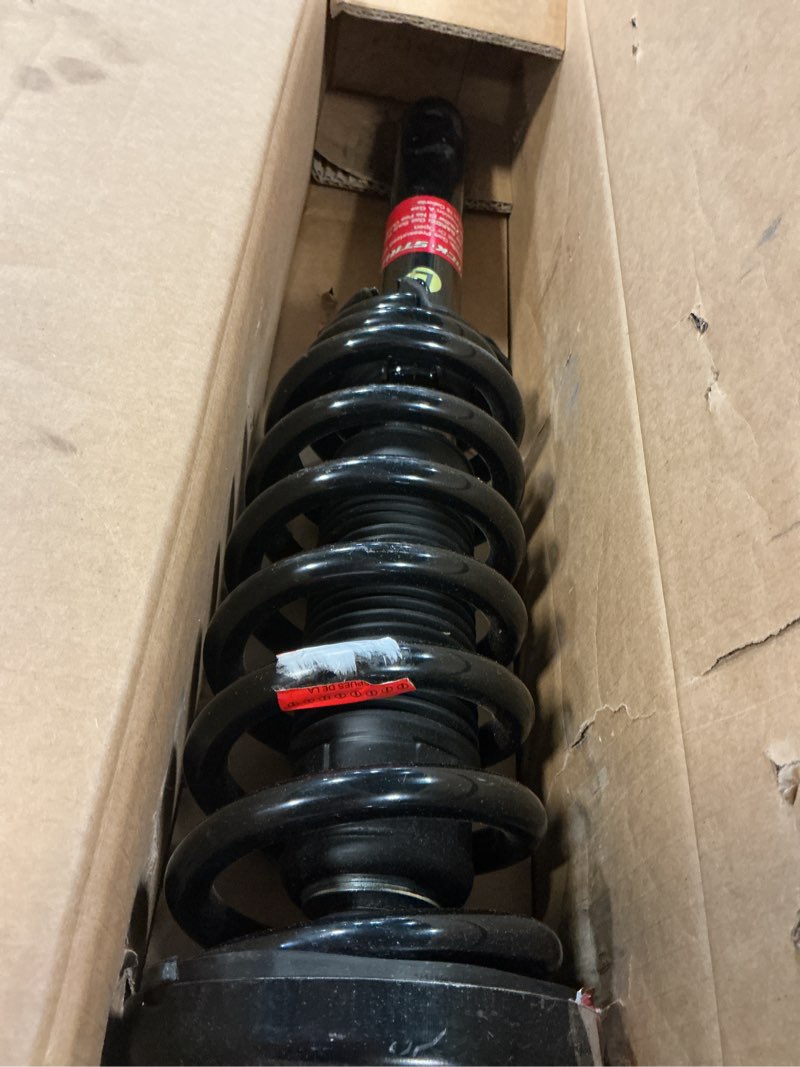 Condition photo showing As Is for monroe quick-strut 172123l suspension strut and coil spring assembly for honda accord