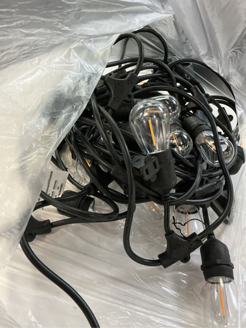 Condition photo showing As Is for harbor breeze 48-ft plug-in black indoor/outdoor string light with 24 white -light led edison bulbs