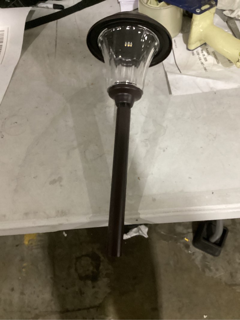Condition photo showing As Is for harbor breeze 15 -lumens oil-rubbed bronze solar led outdoor path light with dusk-to-dawn