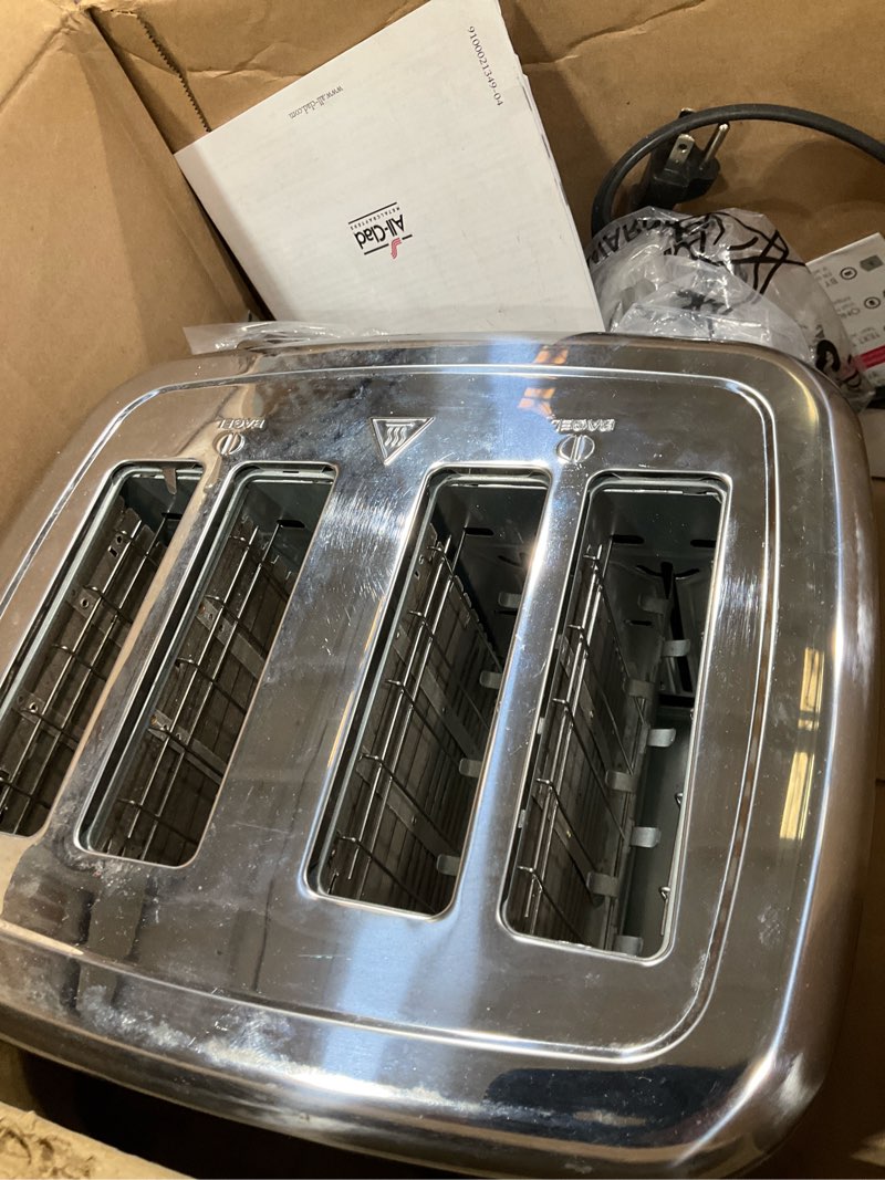 Condition photo showing As Is for all-clad electric stainless steel toaster, 4-slice, led display, removable crumb tray, internal cord storage, 6 browning levels, wide and self-centering slots, waffles, bagels, bread, silver 4 slice led