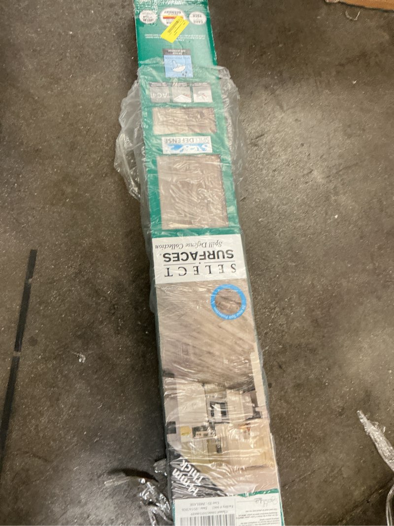 Condition photo showing As Is for select surfaces southern gray spill defense laminate flooring