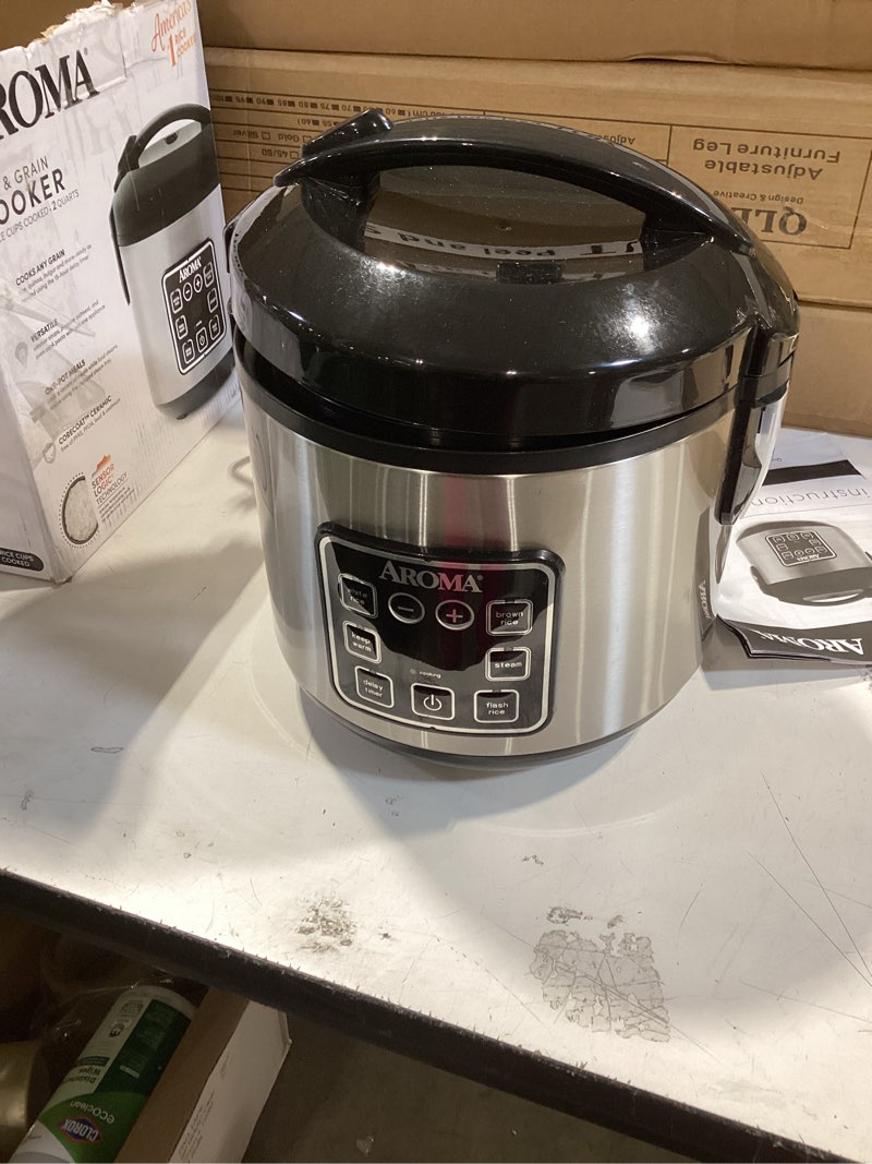 Condition photo showing Good Condition for AROMA Digital Rice Cooker, 4-Cup (Uncooked) / 8-Cup (Cooked), Steamer, Grain Cooker, Multicooker, 2 Qt, Stainless Steel Exterior, ARC-914SBD 4 Cup Uncooked / 8 Cup Cooked