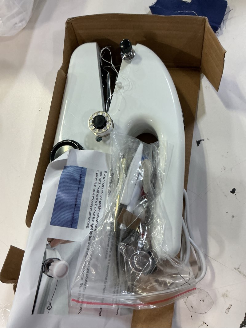 Condition photo showing As Is for Handheld Sewing Machine,Two dear,Mini sewing machine,Easy to Use and Fast Stitch Suitable for Clothes,Fabrics, DIY Home Travel Electric Handheld Sewing Machine for Beginners.White Upgrade White