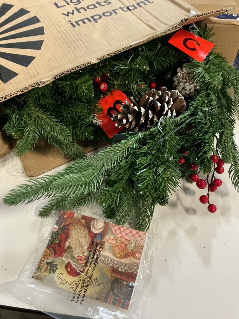 Condition photo showing Good Condition for Brightown 24 Inch Pre-Lit Artificial Christmas Wreaths for Front Door,Christmas Decorations Indoor with Pine Cones & Berry Clusters, Christmas Wreath with 50 Lights for Fireplace Wall Window, Plug-in