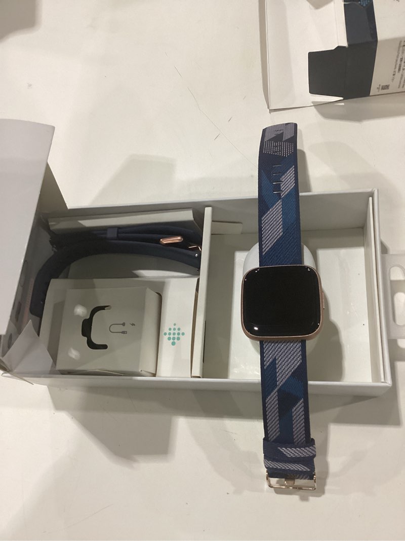 Condition photo showing New/Like New for Fitbit Versa 2 Special Edition Health and Fitness Smart Watch with Heart Rate, Music, Alexa Built-In, Sleep and Swim Tracking, Navy and Pink Woven/Copper Rose, One Size (S and L Bands Included), 2.3 Navy & Pink Woven/Copper Rose Special Edition