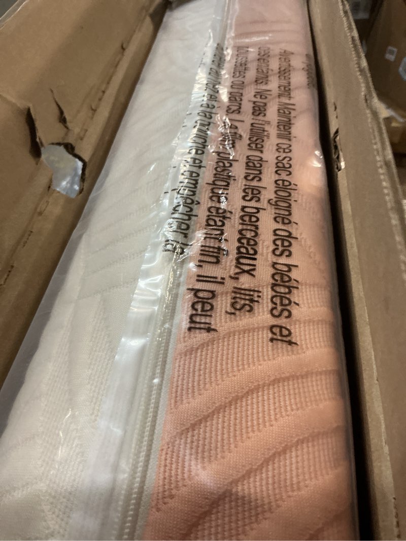 Condition photo showing Good Condition for Delta Children Summer Breeze Mattress - Breathable Baby Crib & Toddler Mattress with Cloud Core - Machine Washable Cover - GREENGUARD Gold – Waterproof - Sustainably Sourced Core, Apricot/White Summer Crib Mattress